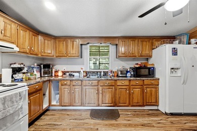 Lake view home on Nolin Lake featuring a boat slip and plenty of - photo 23