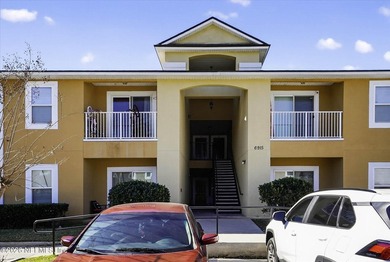 Bright and move-in ready second-floor condo in desirable Woods - photo 4