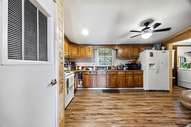 Lake view home on Nolin Lake featuring a boat slip and plenty of - photo 24