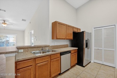 Bright and move-in ready second-floor condo in desirable Woods - photo 9