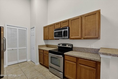 Bright and move-in ready second-floor condo in desirable Woods - photo 10