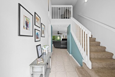 Nestled in the heart of Boca Raton, this two story townhome on a - photo 2