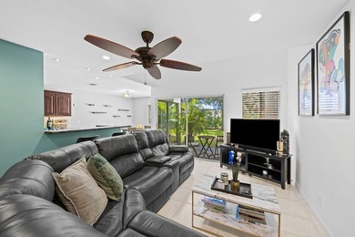 Nestled in the heart of Boca Raton, this two story townhome on a - photo 4