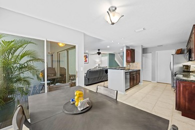Nestled in the heart of Boca Raton, this two story townhome on a - photo 5