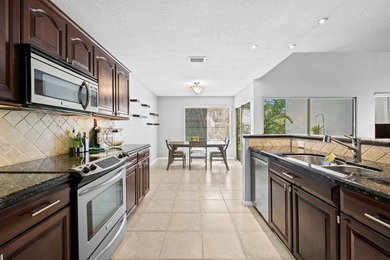 Nestled in the heart of Boca Raton, this two story townhome on a - photo 7
