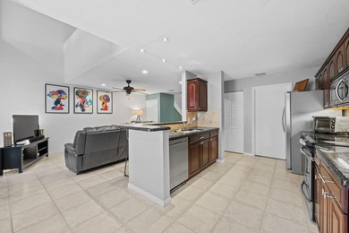 Nestled in the heart of Boca Raton, this two story townhome on a - photo 9