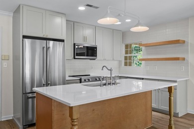 This stunning 3-bedroom, 2-bath single-level home is nestled in - photo 10