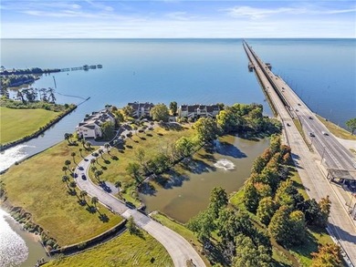 Waterfront living in the heart of Mandeville. This 3 bedroom, 3