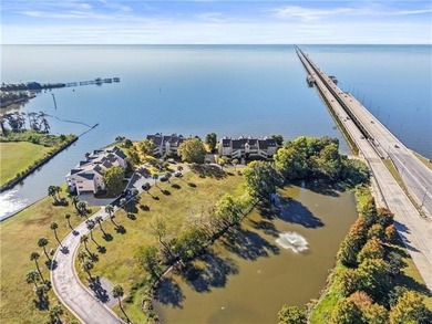 Waterfront living in the heart of Mandeville. This 3 bedroom, 3