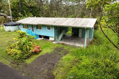 This charming 2 bedroom, 1 bath home is situated on paved - photo 1