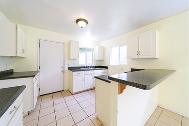 This charming 2 bedroom, 1 bath home is situated on paved - photo 6