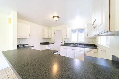 This charming 2 bedroom, 1 bath home is situated on paved - photo 7