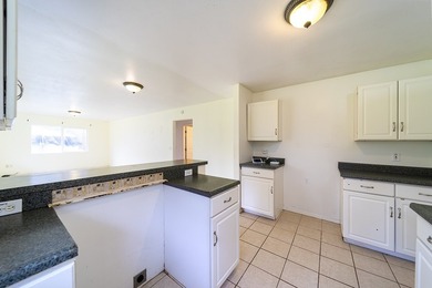 This charming 2 bedroom, 1 bath home is situated on paved - photo 9
