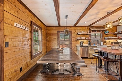 Creekside living has never looked this good! This stunning - photo 6