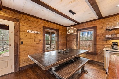 Creekside living has never looked this good! This stunning - photo 7