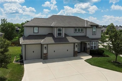 Welcome to this beautifully designed 4-bedroom, 4.5-bath home - photo 1