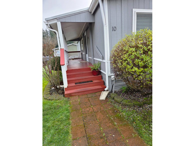 This immaculate **3-bedroom, 2-bath manufactured home** offers