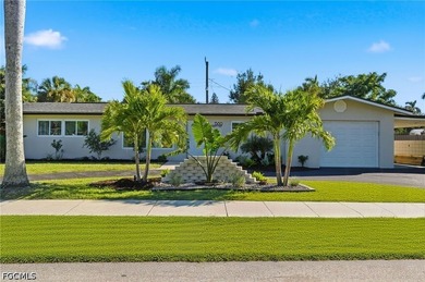 Welcome to this beautifully renovated pool home in the highly - photo 2