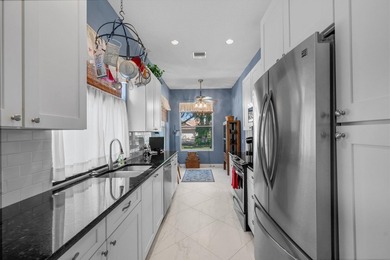 Located in The Hamptons at Maplewood-one of Jupiter's most - photo 14
