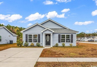 Welcome to 82 Desurrency Ct, a beautifully maintained 3 bedroom - photo 1