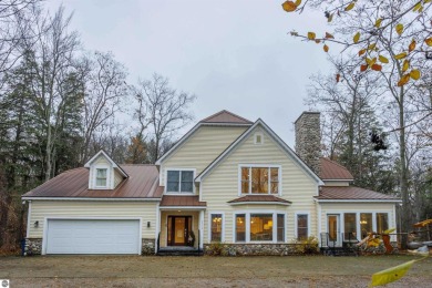 Lake Home For Sale in Honor, Michigan