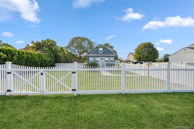 Welcome to 48 Farmers Avenue in Lindenhurst. A Charming and - photo 2