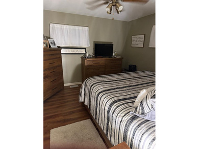 This charming 2-bedroom, 1-bath home has been lovingly