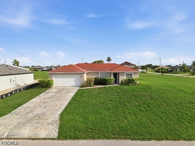 3-bedroom, 2-bath home offering an open-concept layout with tile - photo 3