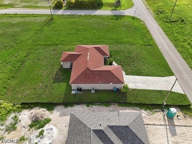 3-bedroom, 2-bath home offering an open-concept layout with tile - photo 7