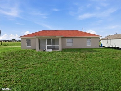 3-bedroom, 2-bath home offering an open-concept layout with tile - photo 9