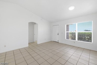 3-bedroom, 2-bath home offering an open-concept layout with tile - photo 10