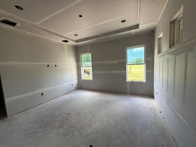 Spectacular views of the golf course from this new 3/2.5/3 home - photo 12