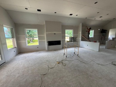 Spectacular views of the golf course from this new 3/2.5/3 home - photo 18