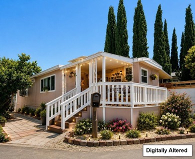 Located in Golden Wheel Mobile Home Park, this home offers 2 - photo 1