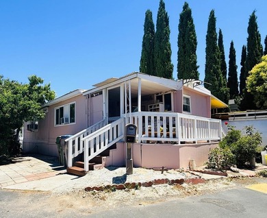 Located in Golden Wheel Mobile Home Park, this home offers 2 - photo 2