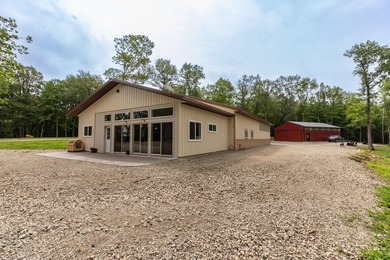 Nestled deep within 60 acres of pristine woodland just 15 - photo 1