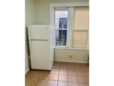 Welcome to this well maintained and updated 2-unit brick home - photo 11