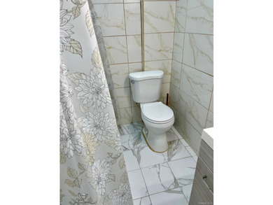 Welcome to this well maintained and updated 2-unit brick home - photo 13