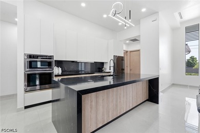 Experience modern waterfront living in this beautifully designed - photo 9