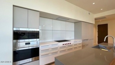 This 3 bedroom, 4 bath residence features an open concept