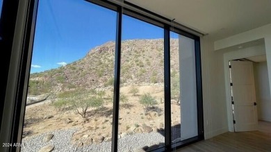 This 3 bedroom, 4 bath residence features an open concept