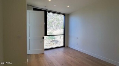 This 3 bedroom, 4 bath residence features an open concept