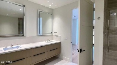 This 3 bedroom, 4 bath residence features an open concept