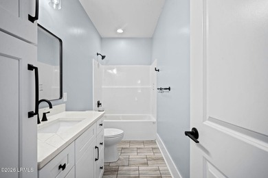 Welcome to this beautifully crafted 2-bedroom, 2-bath cottage - photo 25