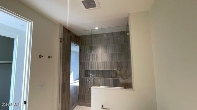 This 3 bedroom, 4 bath residence features an open concept