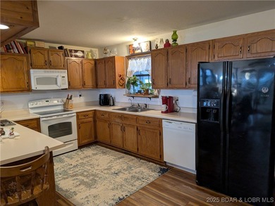 What a lovely family home with large rooms so close to the Lake - photo 12