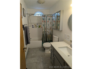 What a lovely family home with large rooms so close to the Lake - photo 24