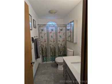 What a lovely family home with large rooms so close to the Lake - photo 25