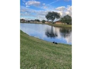 Lake Home For Sale in West Palm Beach, Florida