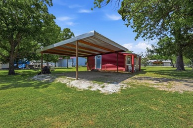 Located just minutes from beautiful Lake Texoma, this charming - photo 3